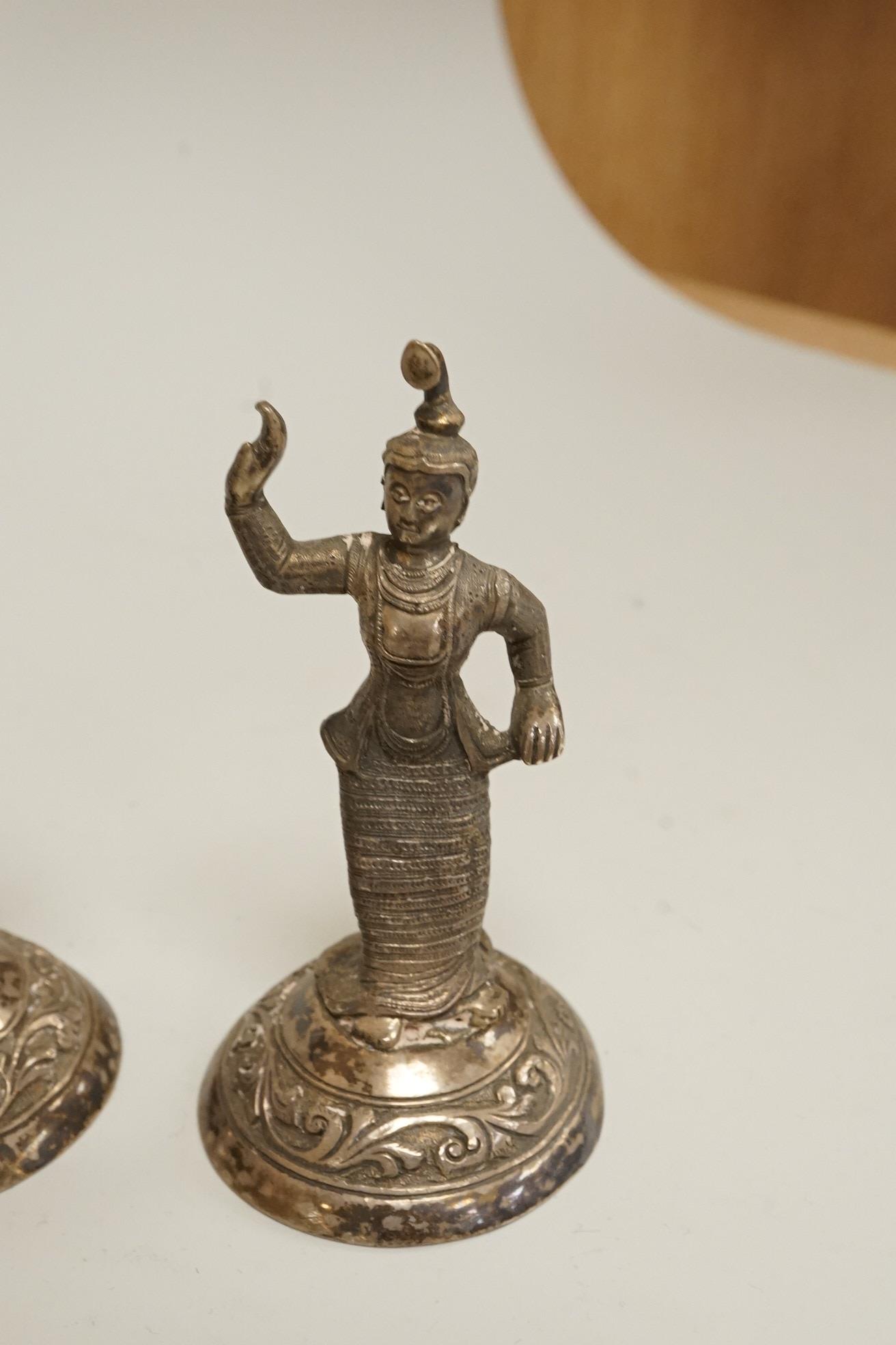 Four early 20th century Thai white metal figurines, 92mm et infra, 11.3oz.